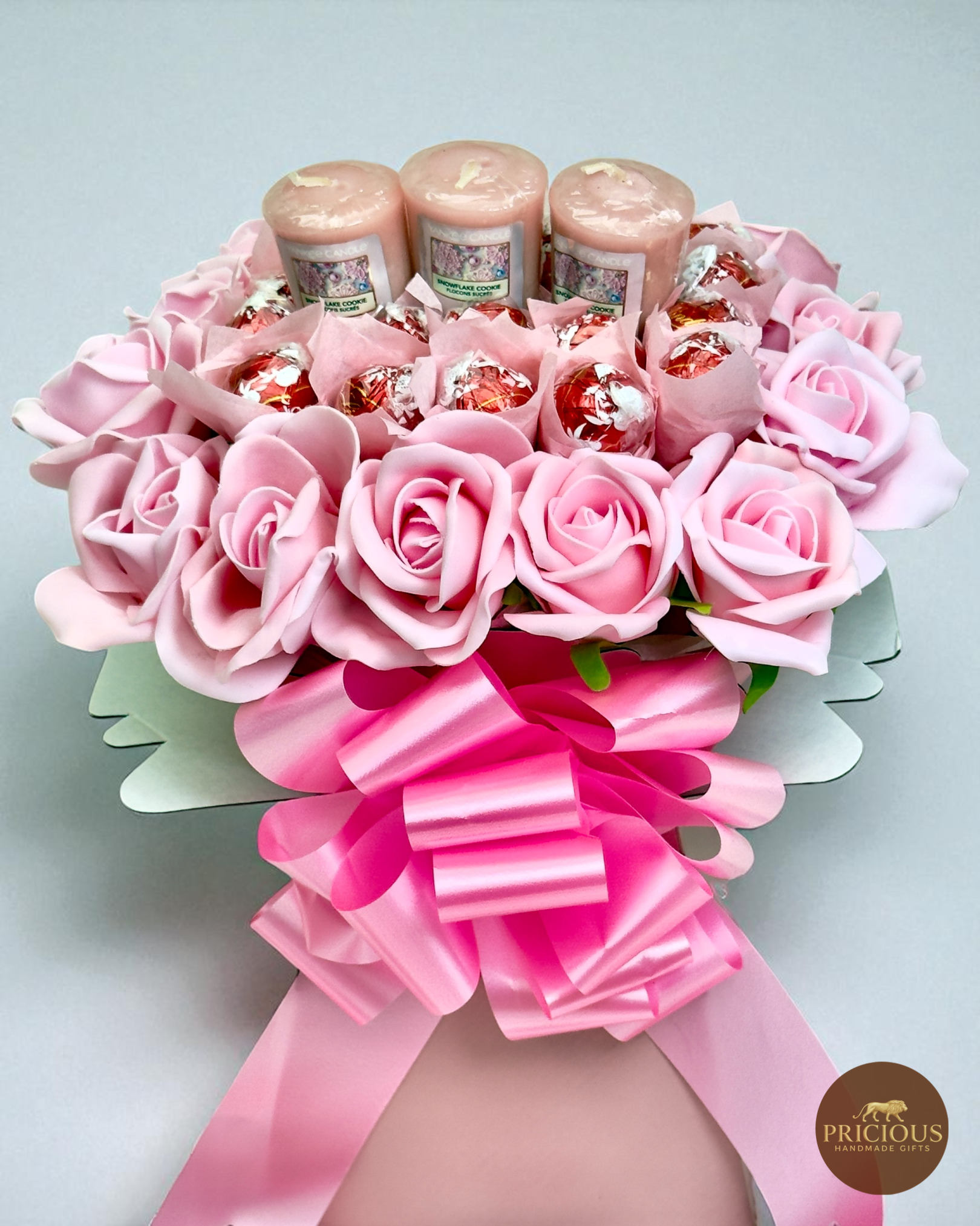 Front view pink chocolate gift bouquet with 4 Yankee Candle votives