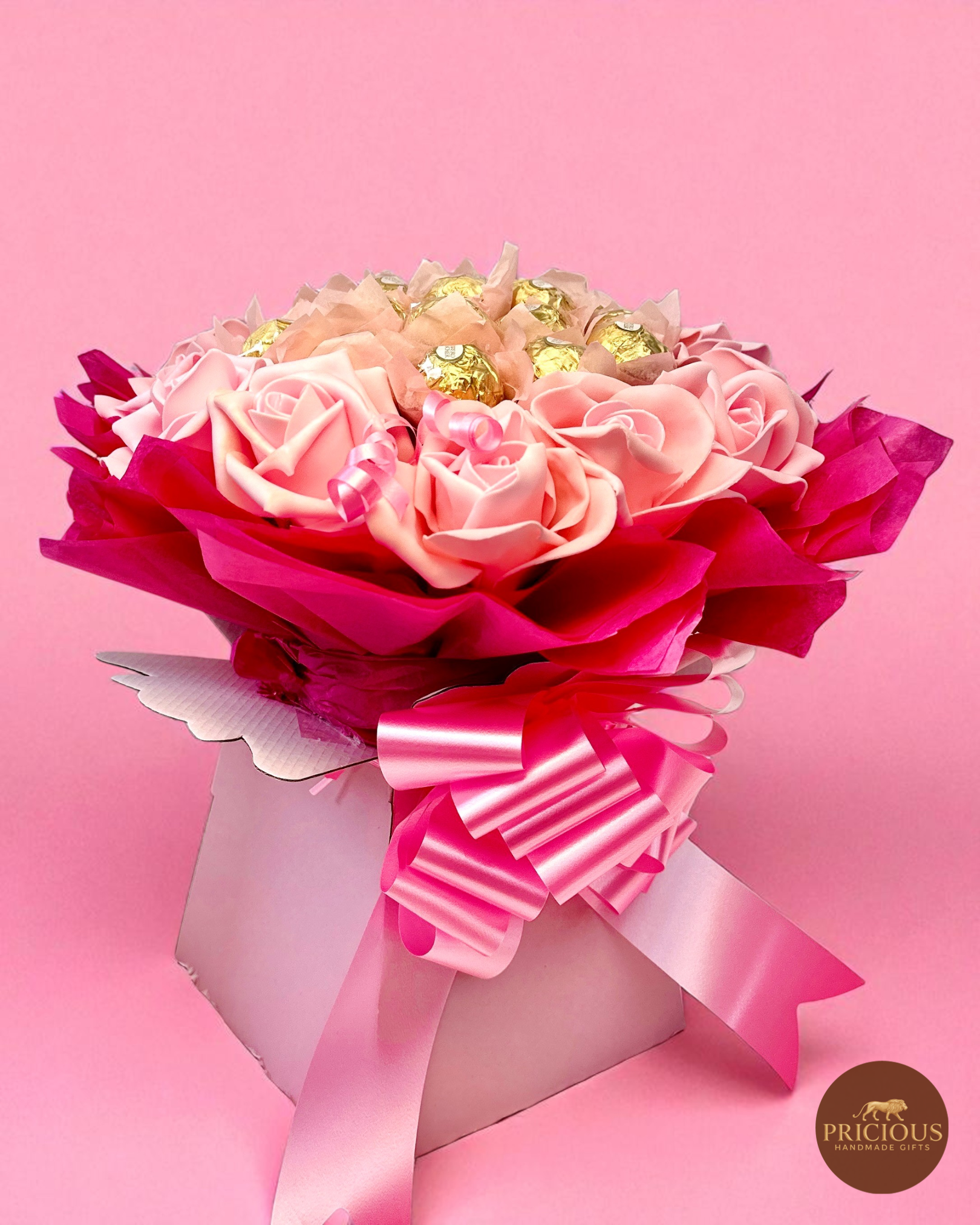 Side view hot-pink wrap Ferrero Rocher rose bouquet