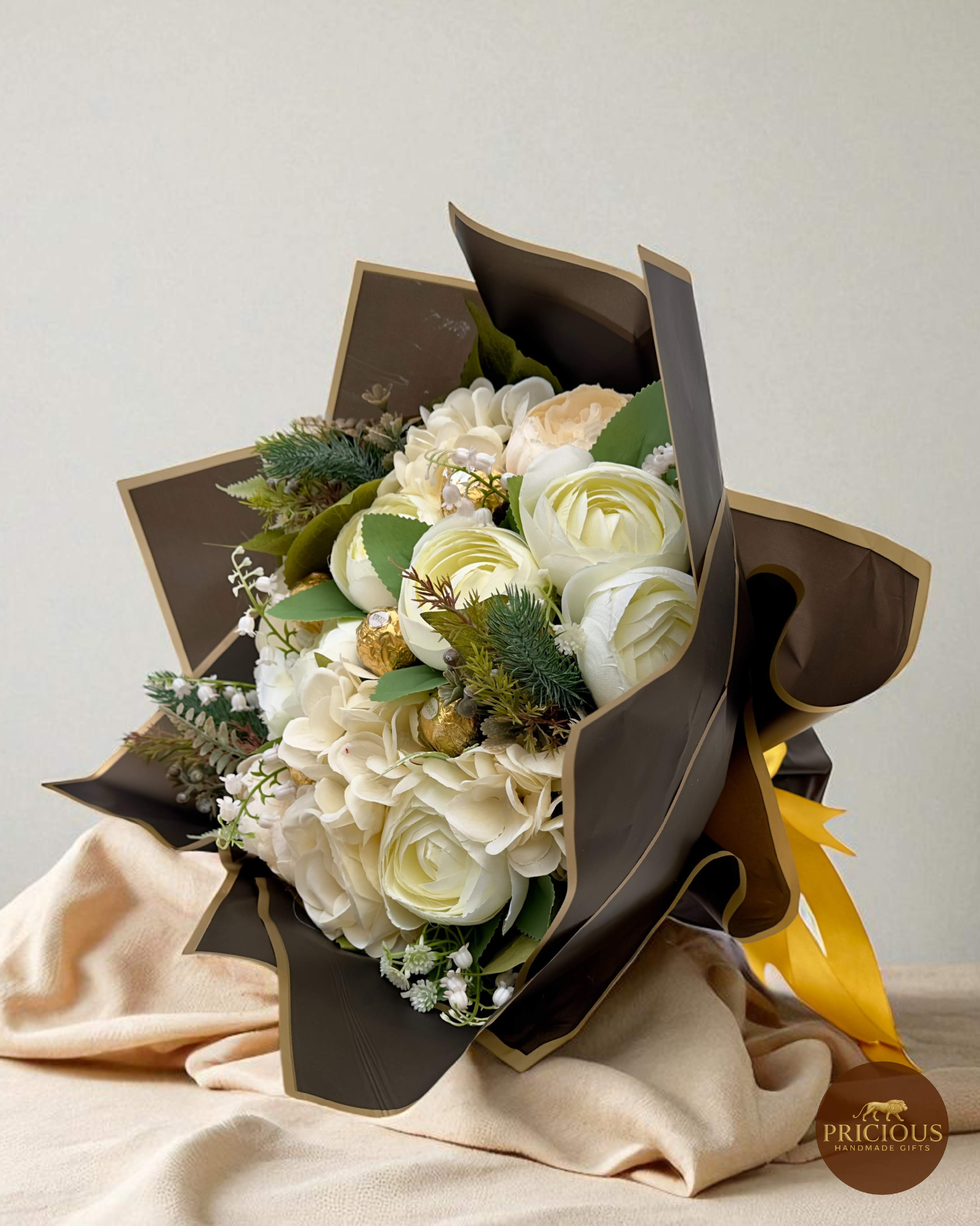 Side view luxury ivory and gold Ferrero Rocher chocolate gift bouquet