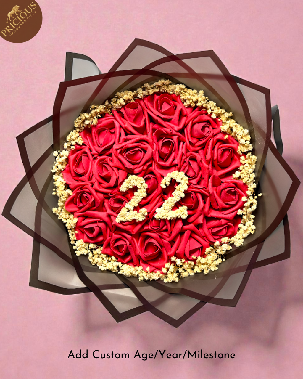 Top view of custom digit bouquet showing golden ‘22’ on red roses