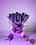 Cadbury Dairy Milk chocolate bouquet in royal purple with satin bow