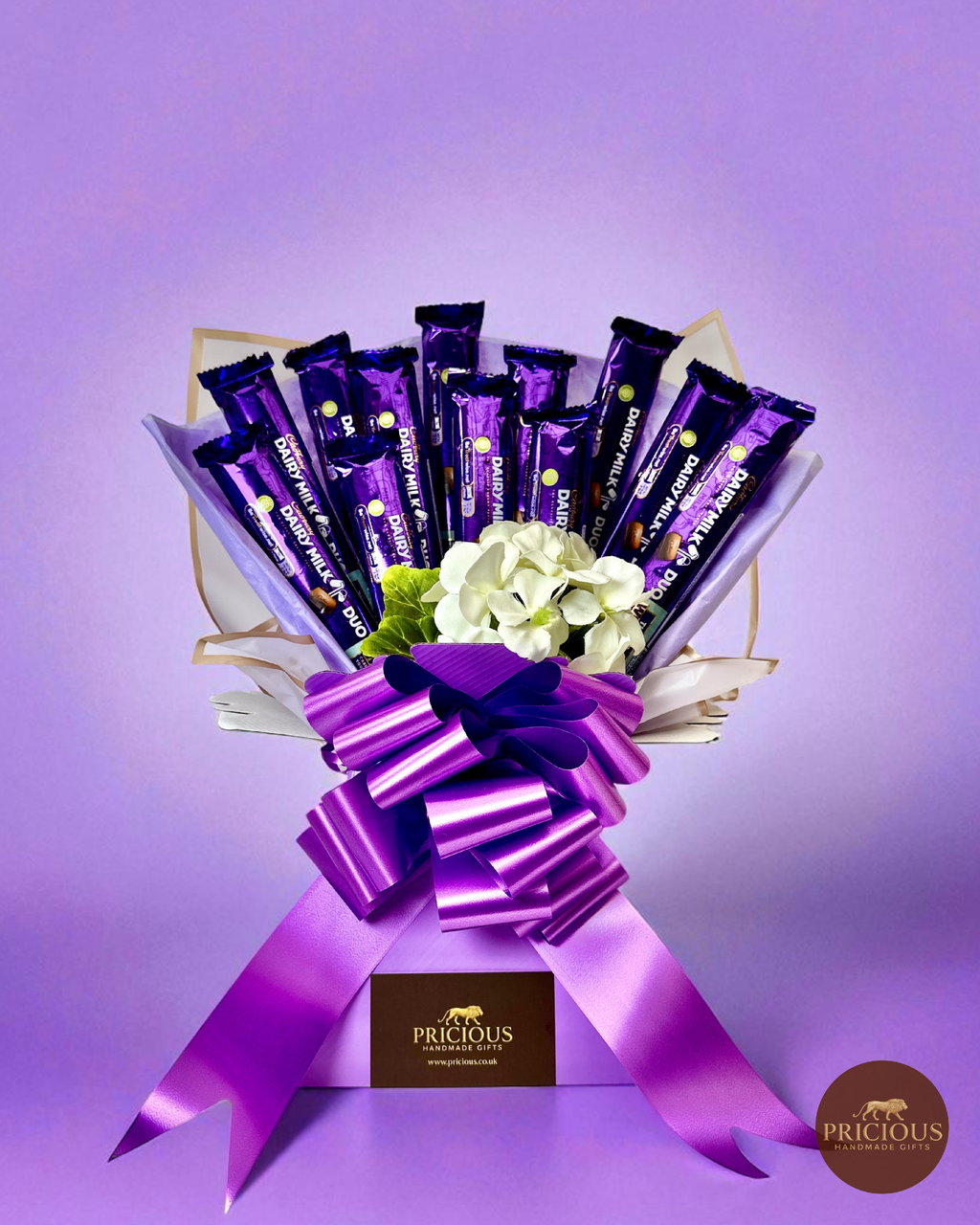 Front view Cadbury Dairy Milk chocolate gift bouquet (purple & ivory)
