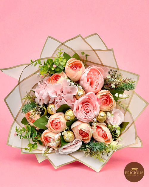 Front view blush pink rose bouquet with Ferrero chocolates and hydrangea