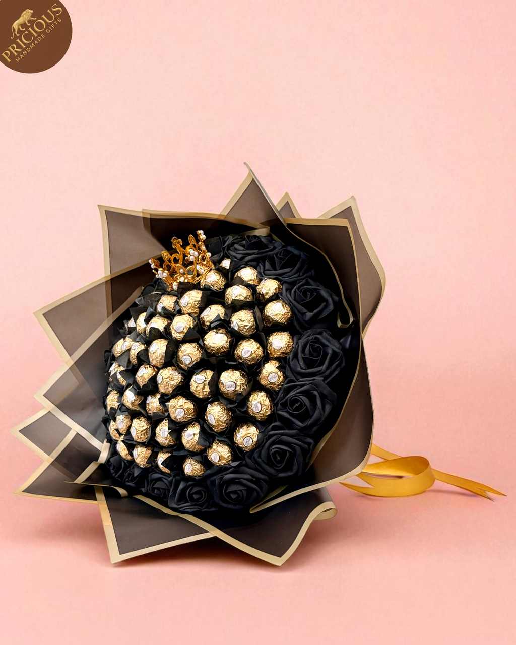 Hand-tied black & gold Ferrero Rocher chocolate bouquet with crown topper and artificial roses.