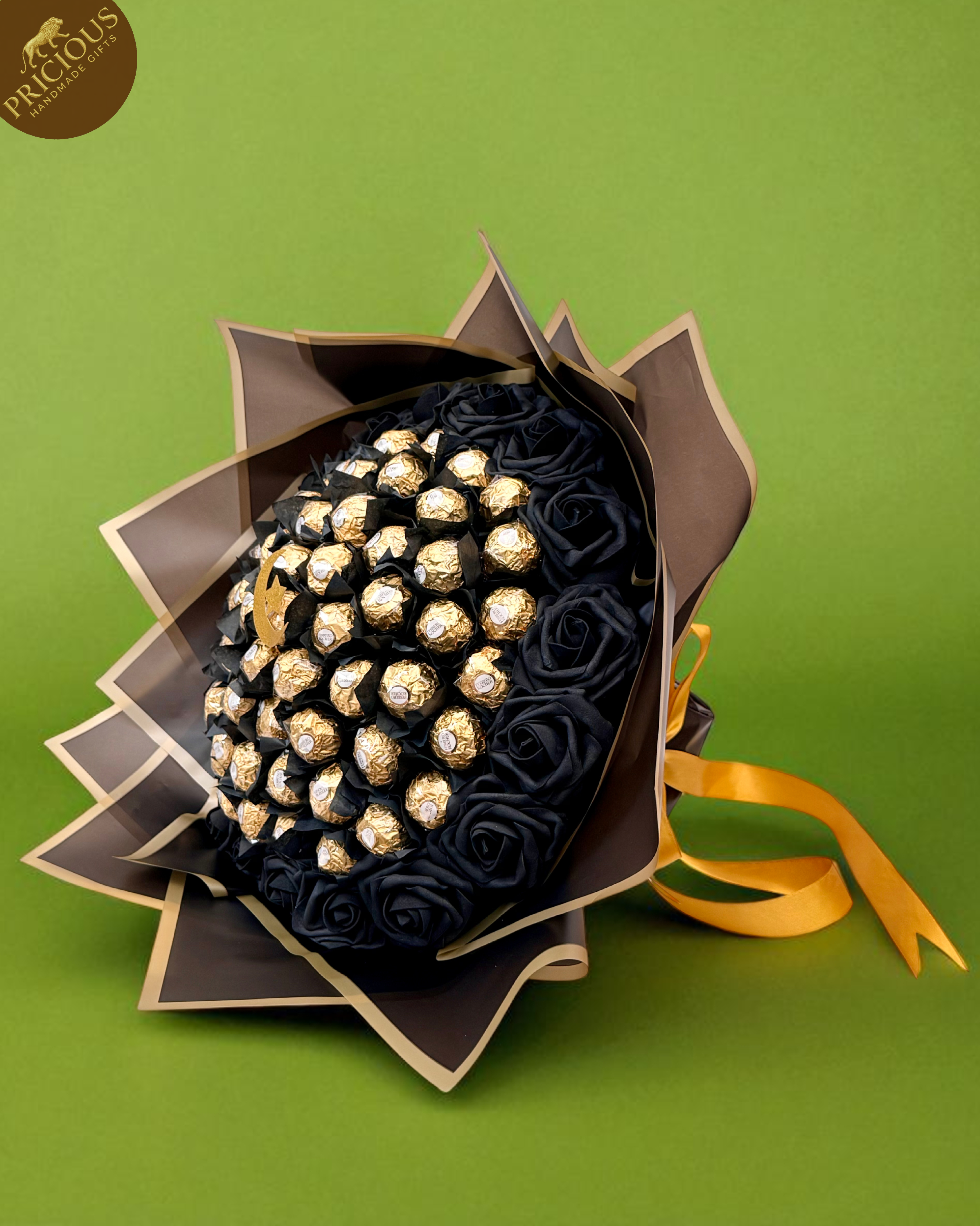 Ferrero Rocher chocolate bouquet with black roses and gold edged wrap, crescent moon topper.