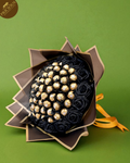 Ferrero Rocher black rose chocolate bouquet in black gold-edged wrap.