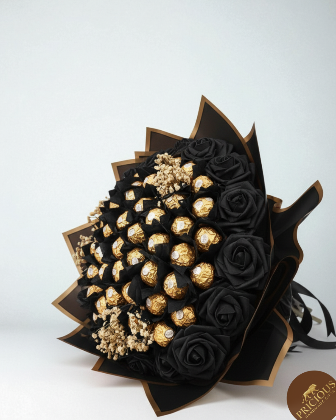 Ferrero Rocher black rose chocolate bouquet in black gold-edged wrap.