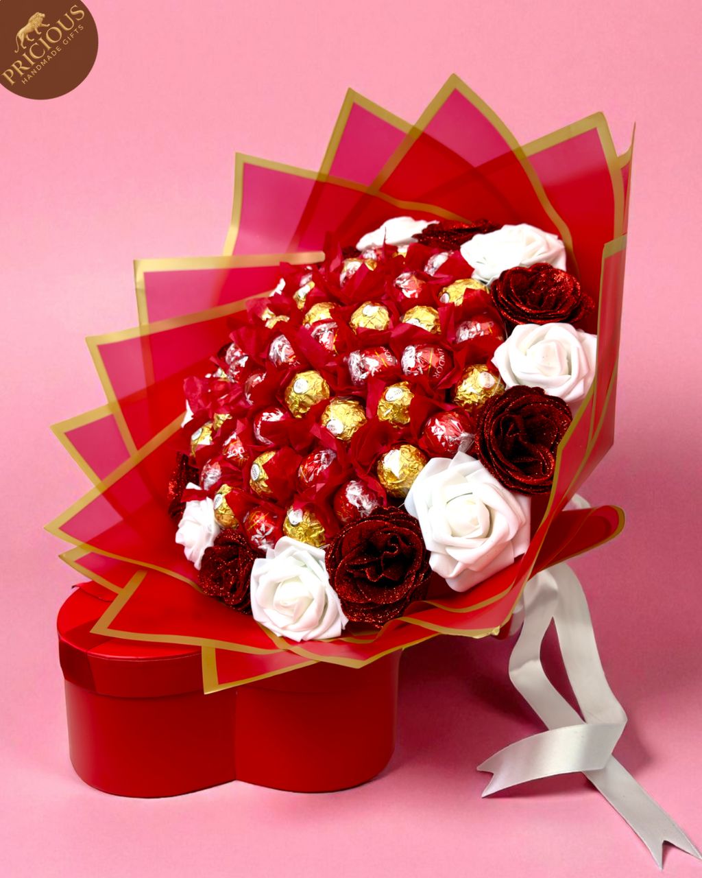 Hand-tied red & white chocolate bouquet with Ferrero & Lindt, LED lights and artificial roses