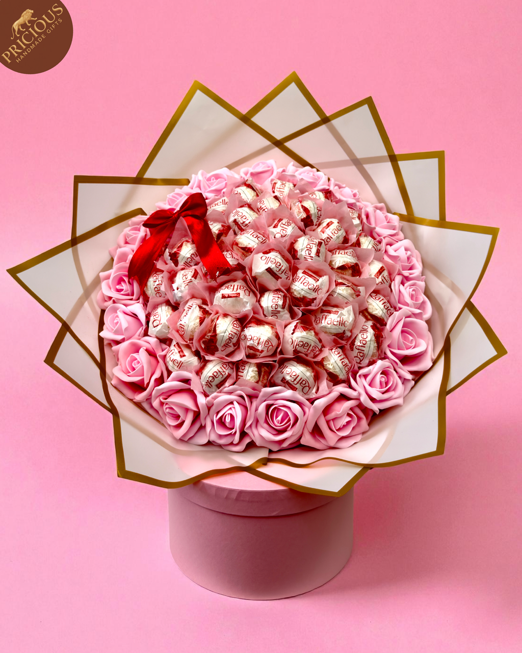 Pink & gold Raffaello bouquet gift in layered wrap, handmade in the UK.