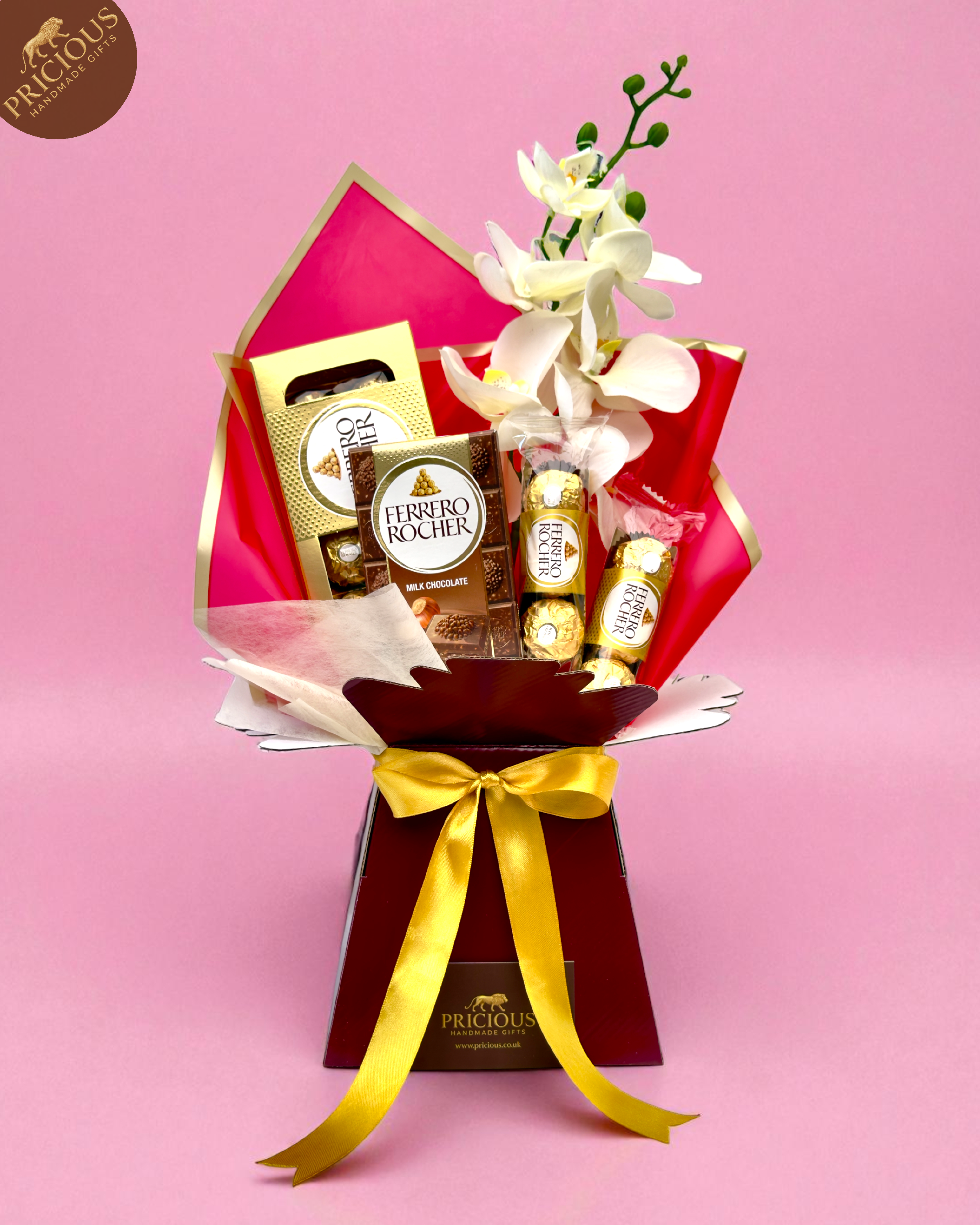 Handmade Ferrero Rocher bouquet box in red & gold with artificial roses and orchid, hand-tied style.