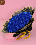 Royal blue glitter rose hand-tied bouquet with king crown in black and gold wrap