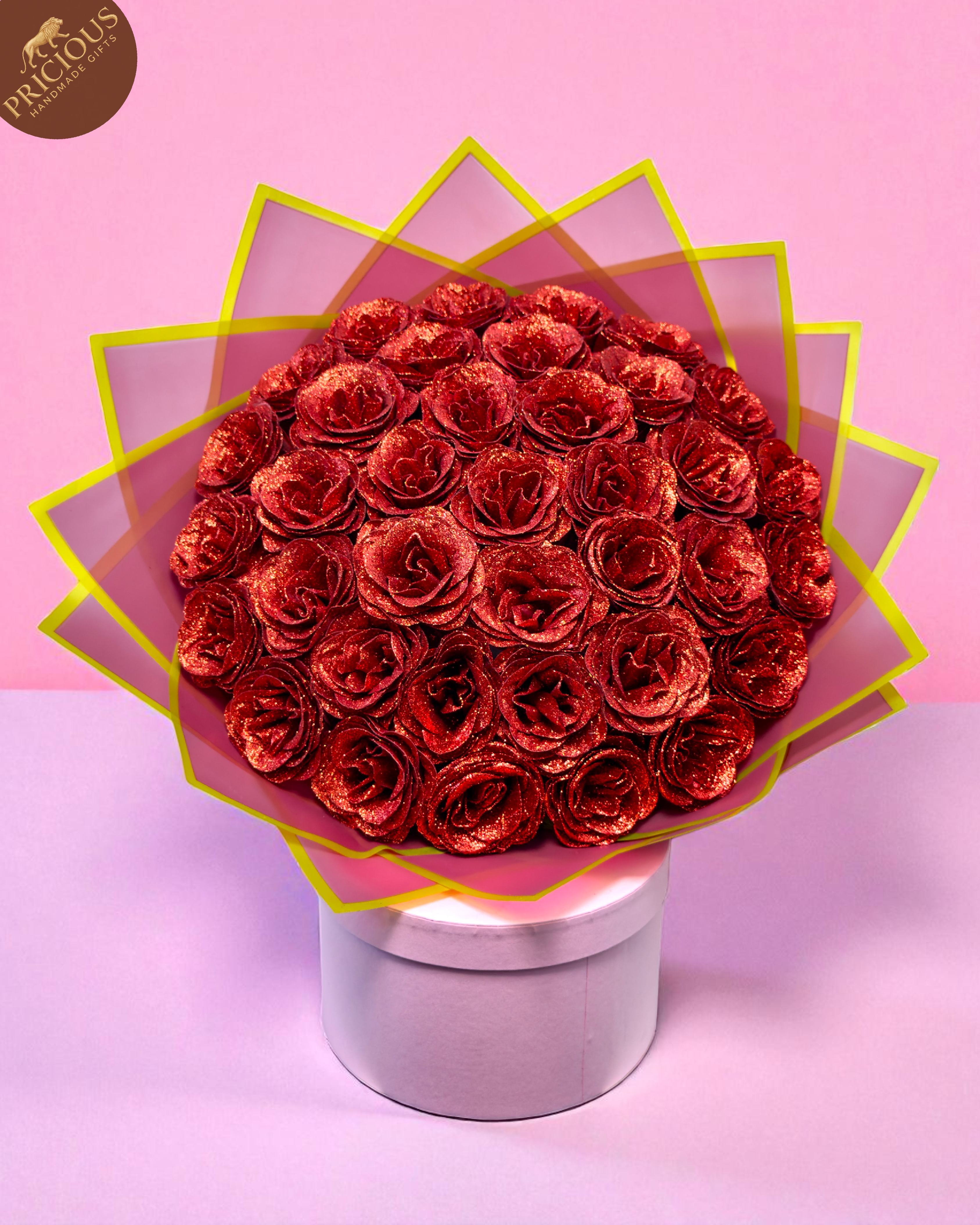 Top-down view of the artificial roses bouquet showing the central dome and neat hand-tied layers.