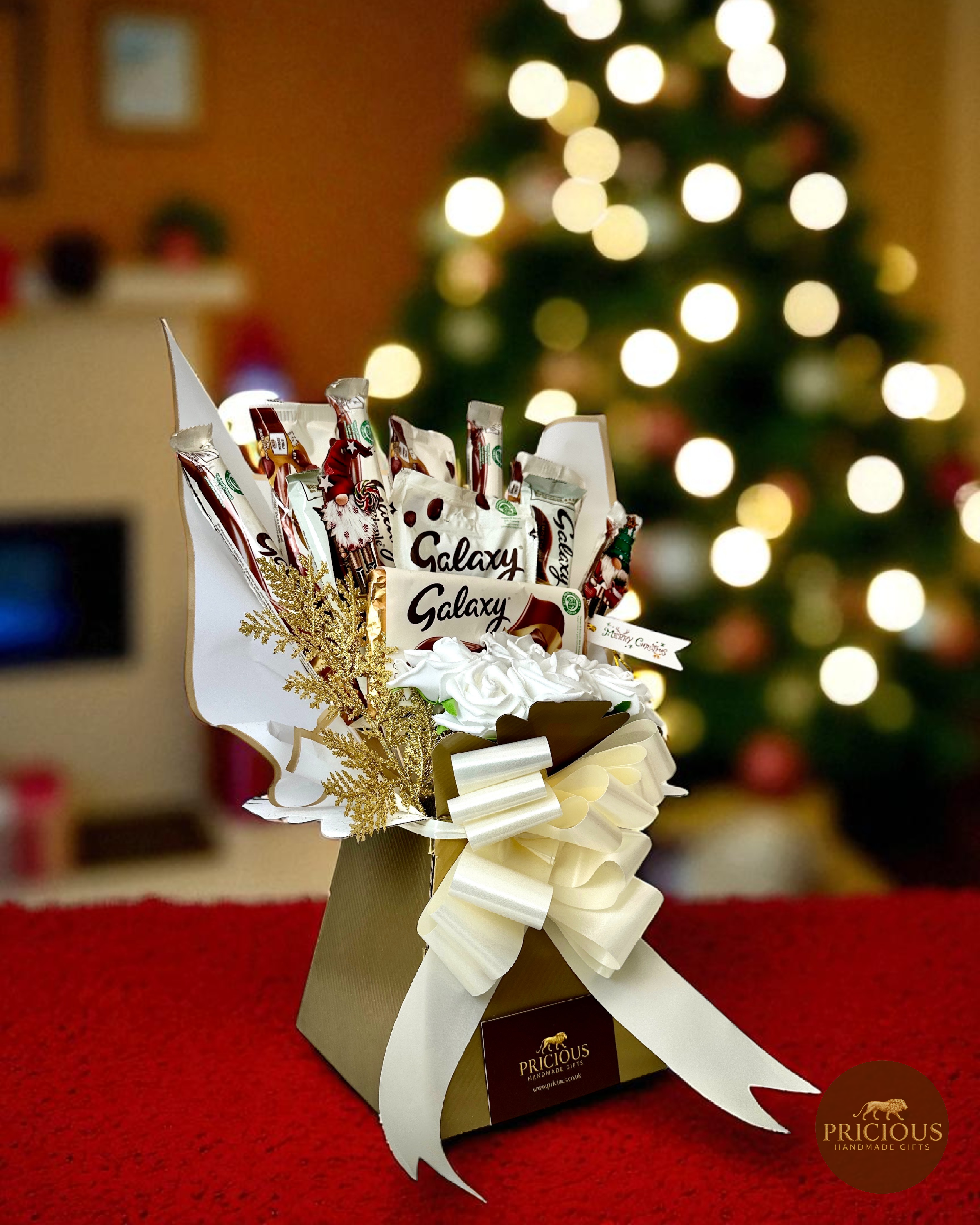 Side view luxury ivory-and-gold Galaxy Christmas chocolate gift bouquet