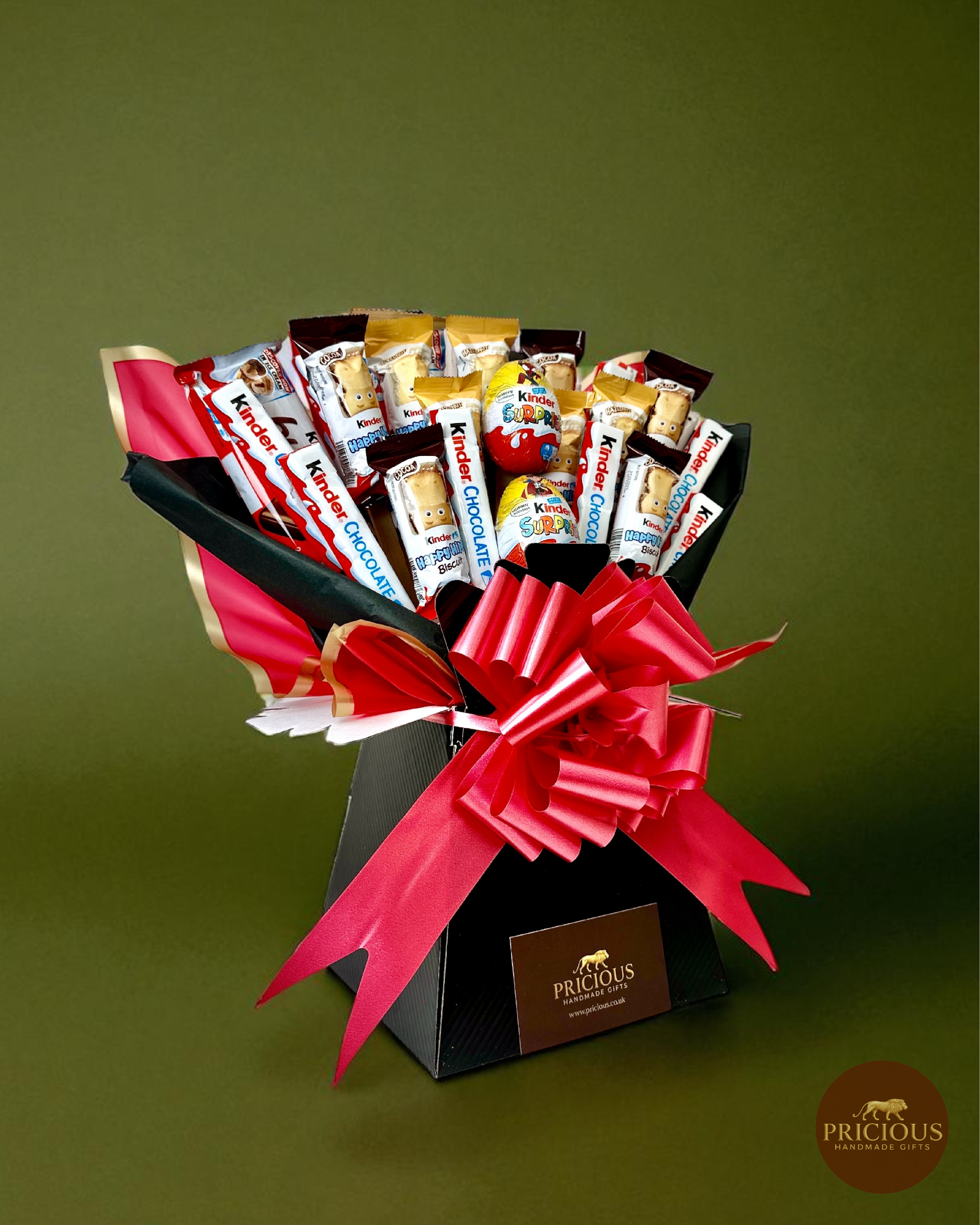 Side view of Kinder chocolate gift bouquet in black box with red bow