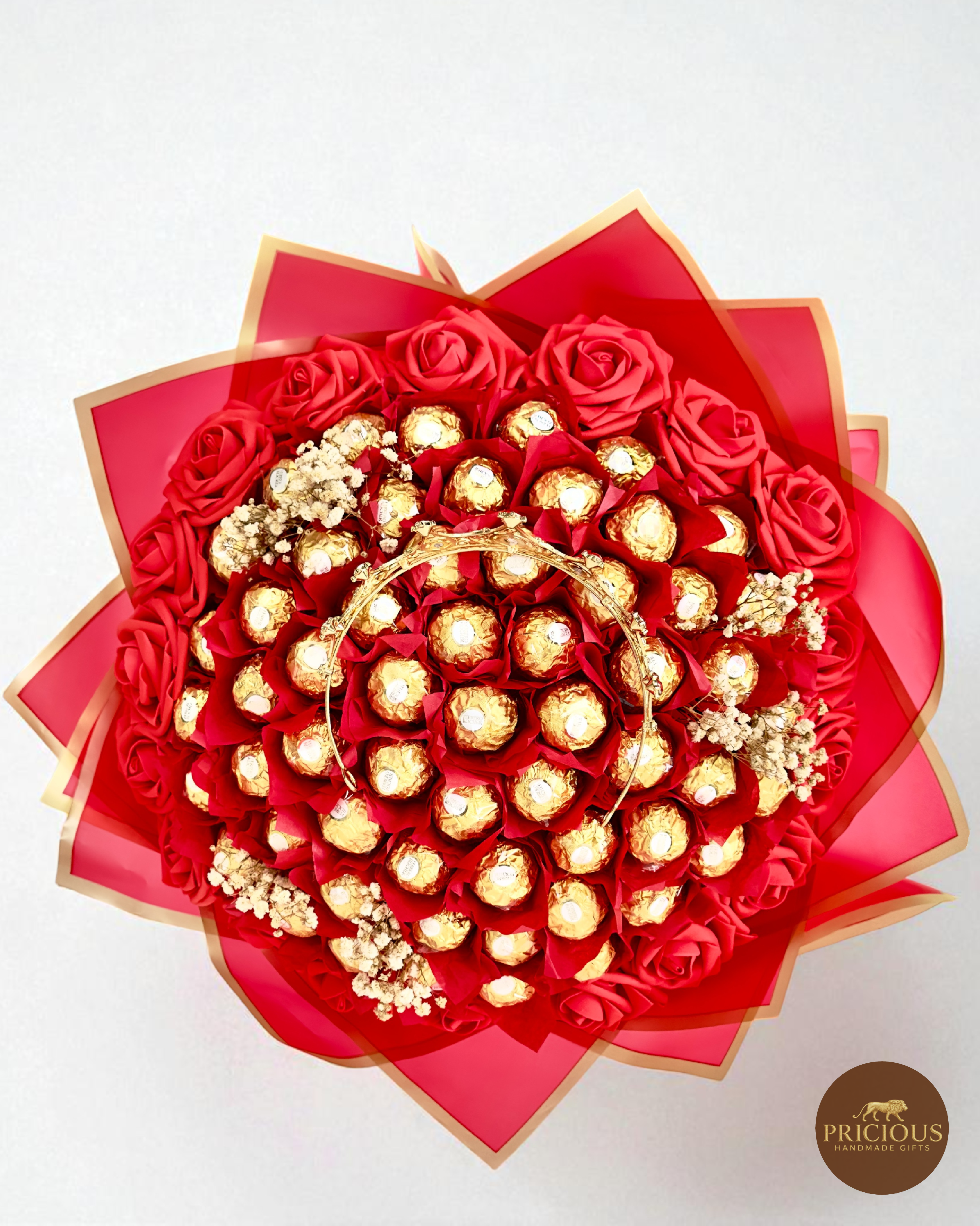 Top view—Ferrero Rocher red rose bouquet with crown and white florals