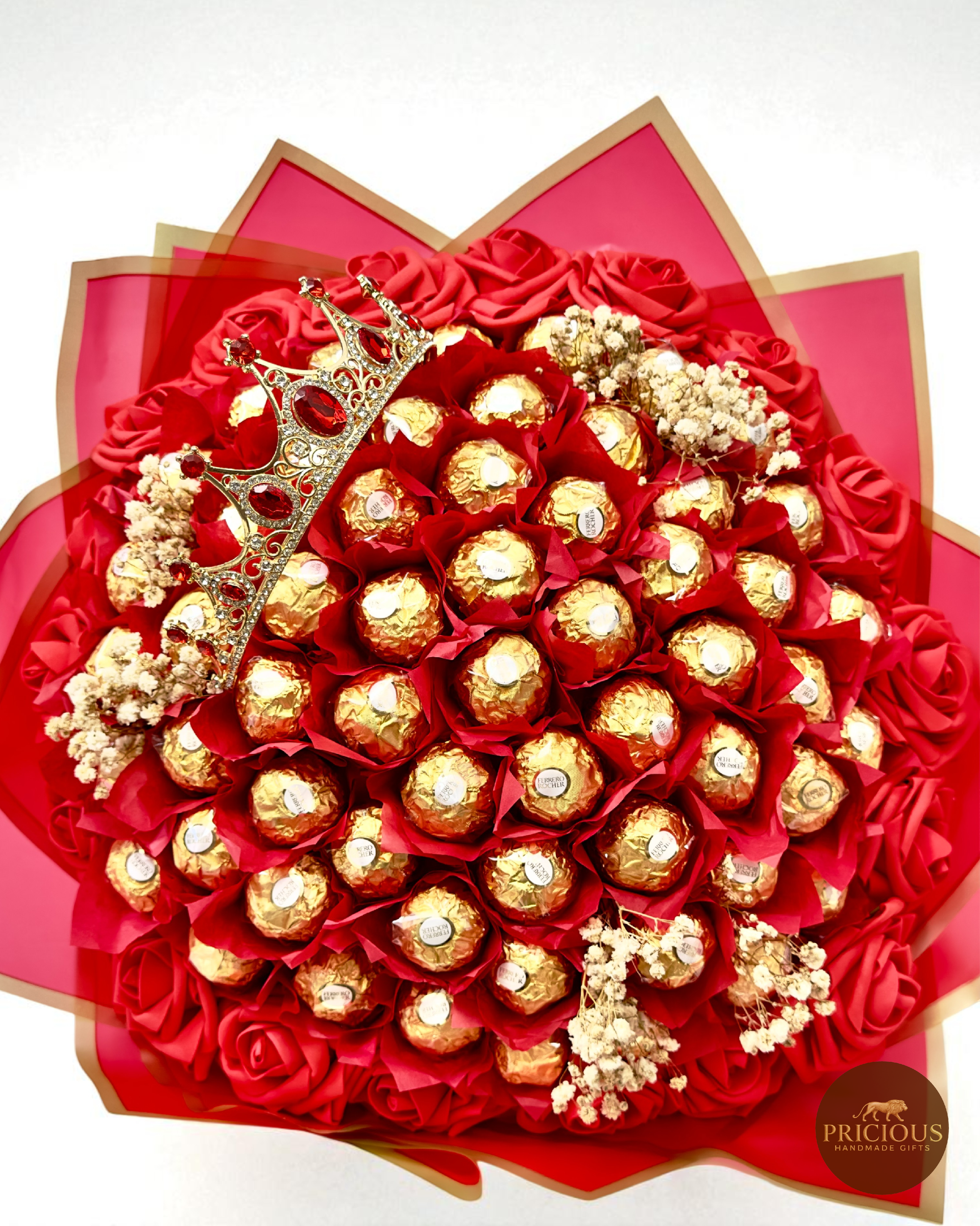 Top view Ferrero Rocher crown bouquet with red roses and white florals