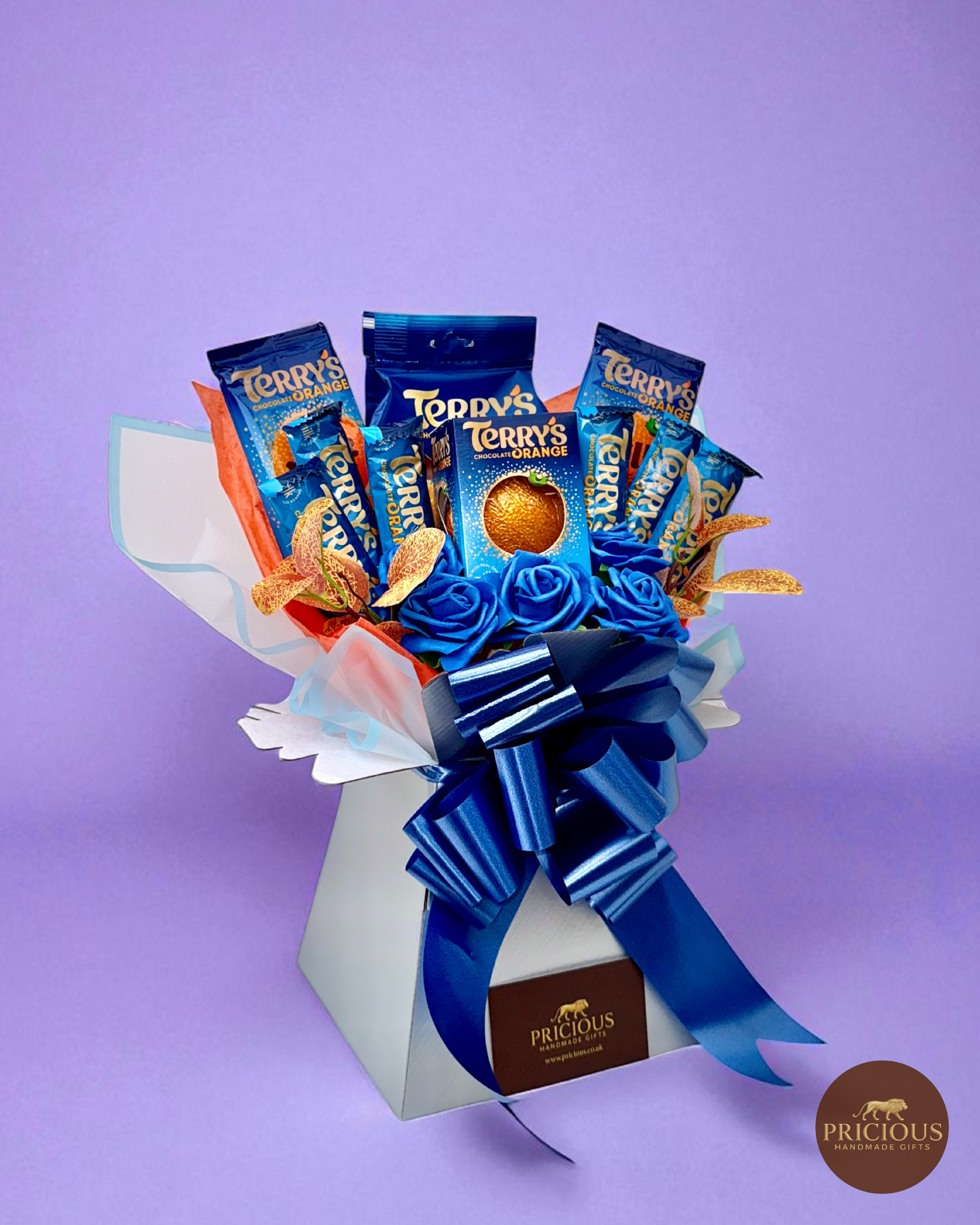 Side view blue & white chocolate bouquet with satin bow