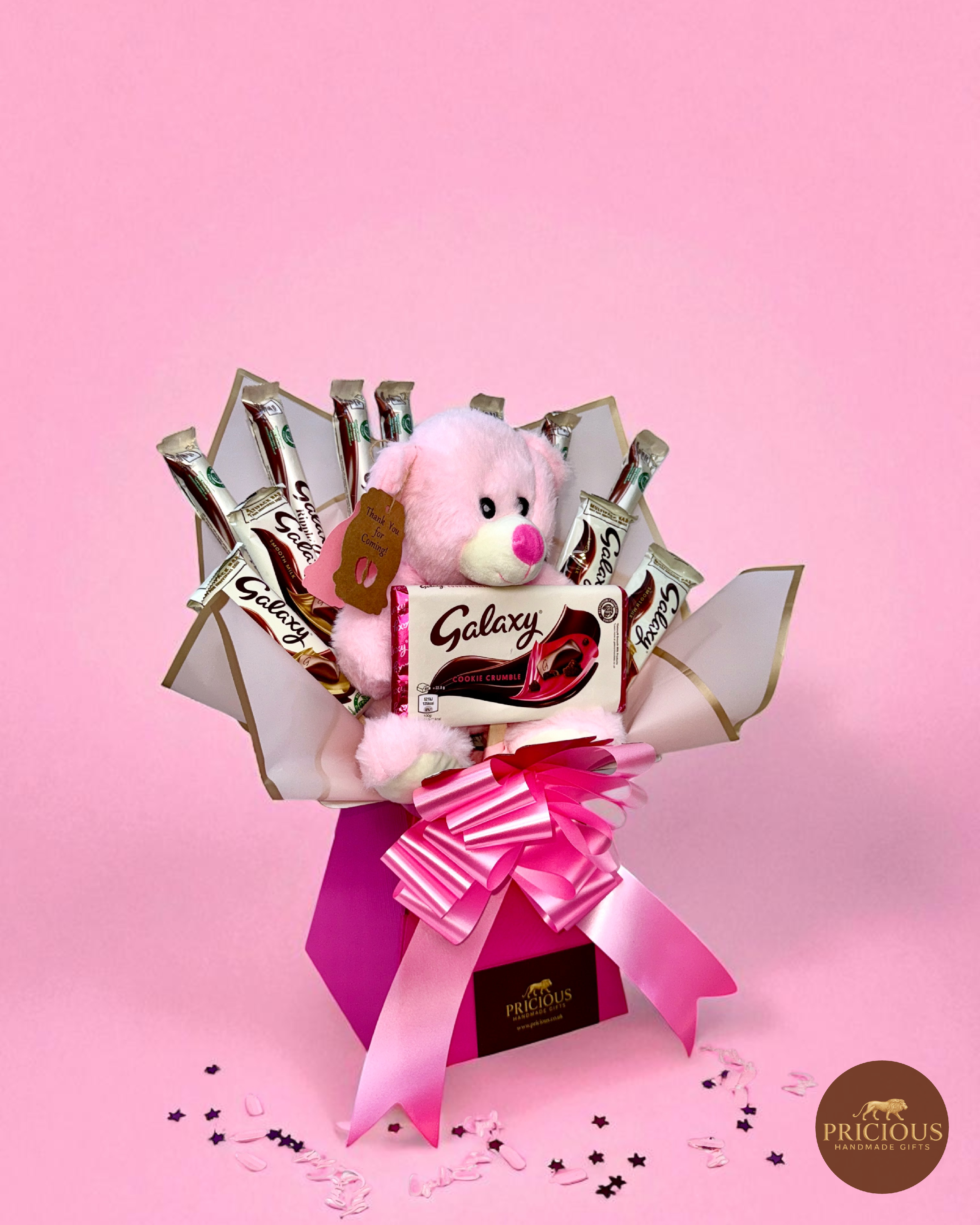 Side view Galaxy pink teddy bouquet with assorted bars