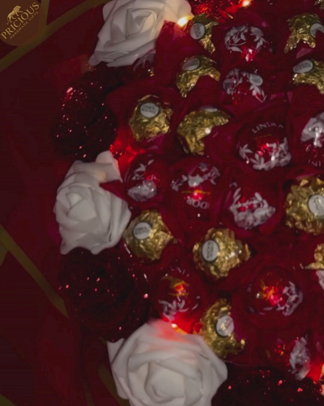 Ferrero & Lindor with Red & White Roses Hand-Tied Chocolate Bouquet with LED Fairy Lights