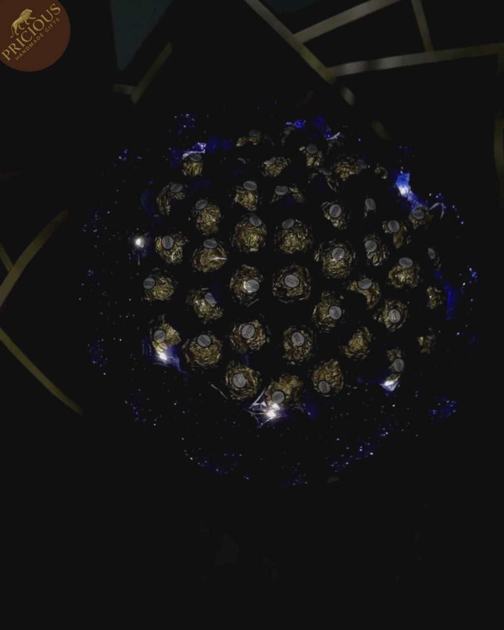 Ferrero Rocher chocolate bouquet, Blue & Gold with LED lights and artificial roses, hand-tied (top view).