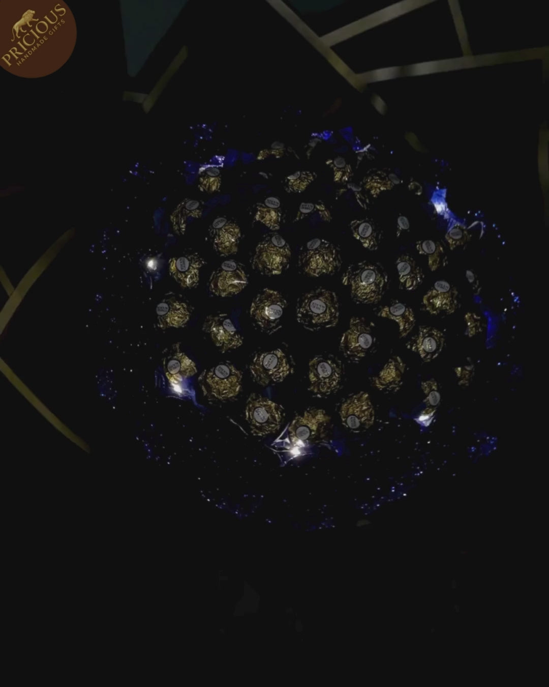 Ferrero Rocher chocolate bouquet, Blue & Gold with LED lights and artificial roses, hand-tied (top view).