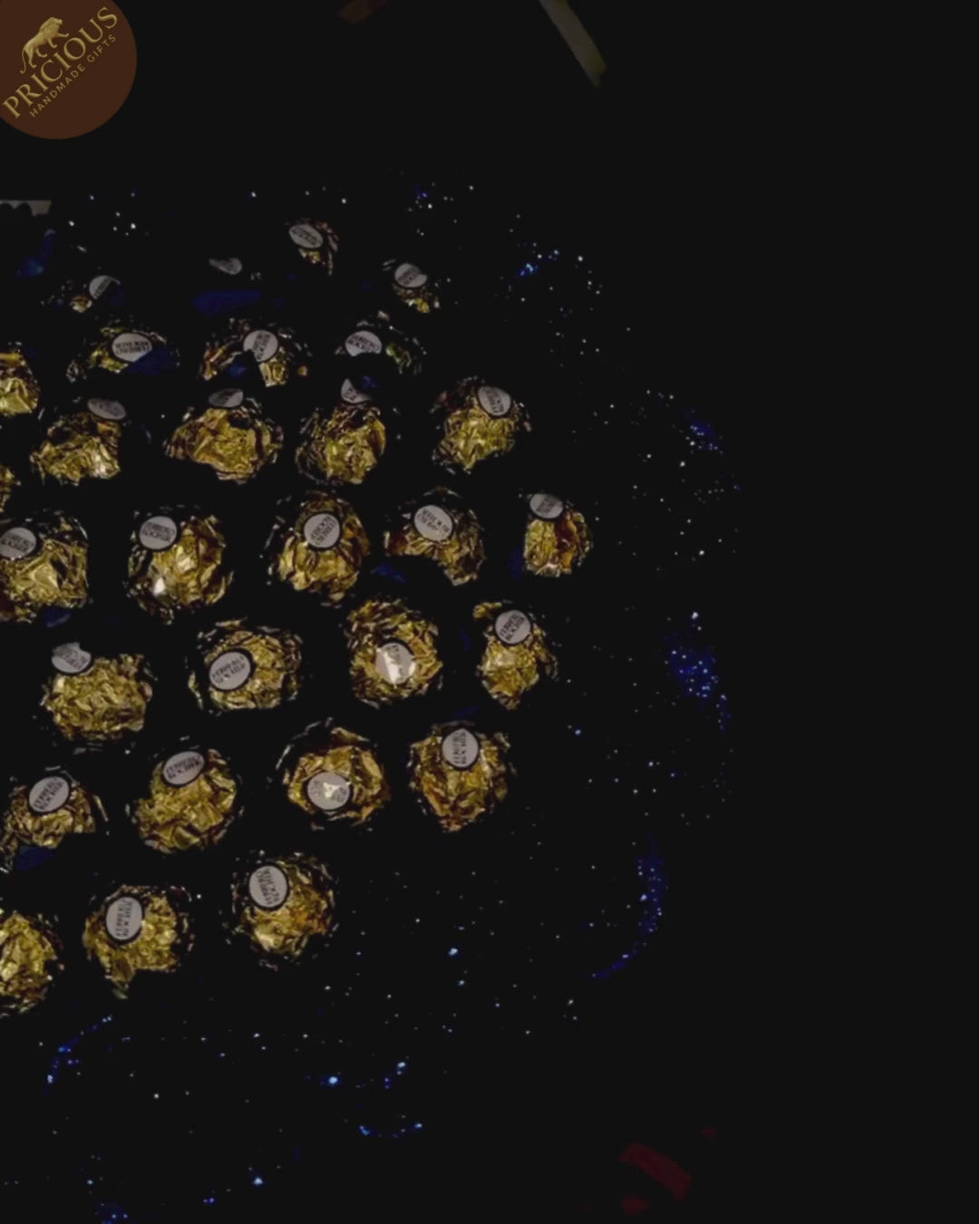 Top view of Blue & Gold Ferrero Rocher bouquet showing layered wrap, neat arrangement and artificial roses.